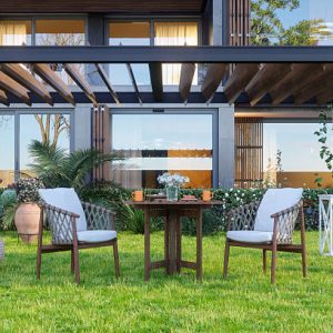 Modern Villa Exterior With Coffee Table And Chairs In The Garden